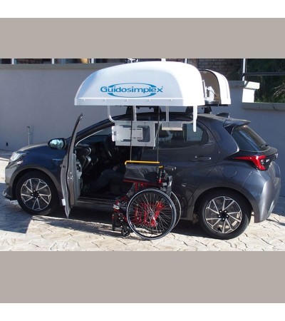 GRÚA DE ELEVACIÓN ALMACENA SILLA DE RUEDA PLEGABLE EN COFRE SOBRE TECHO DE COCHE